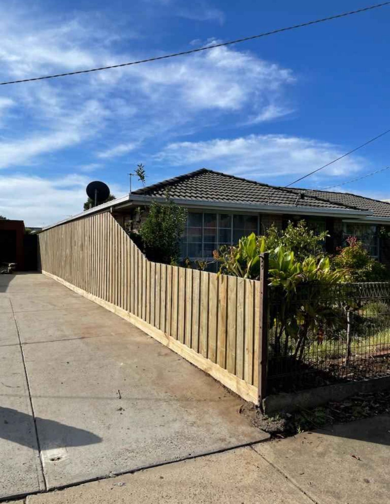 Old paling fence in front of house ready for replacement, Hoppers Crossing